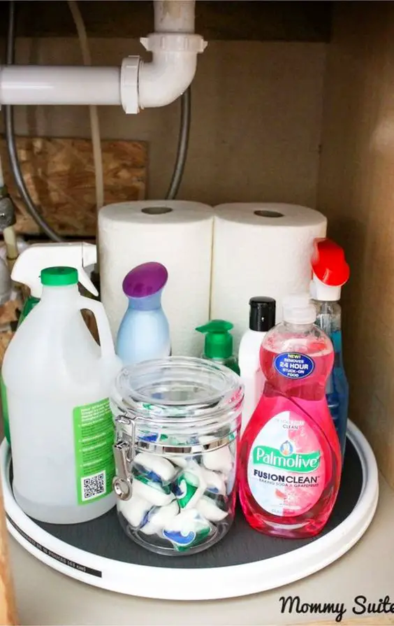 Genius and SIMPLE way to declutter and organize under the kitchen sink #gettingorganized #organizationideasforthehome #getorganized #cleaninghacks #kitchenideas #cleaningtricks #organizedhome #diyideas #diyinspiration #organizingtips