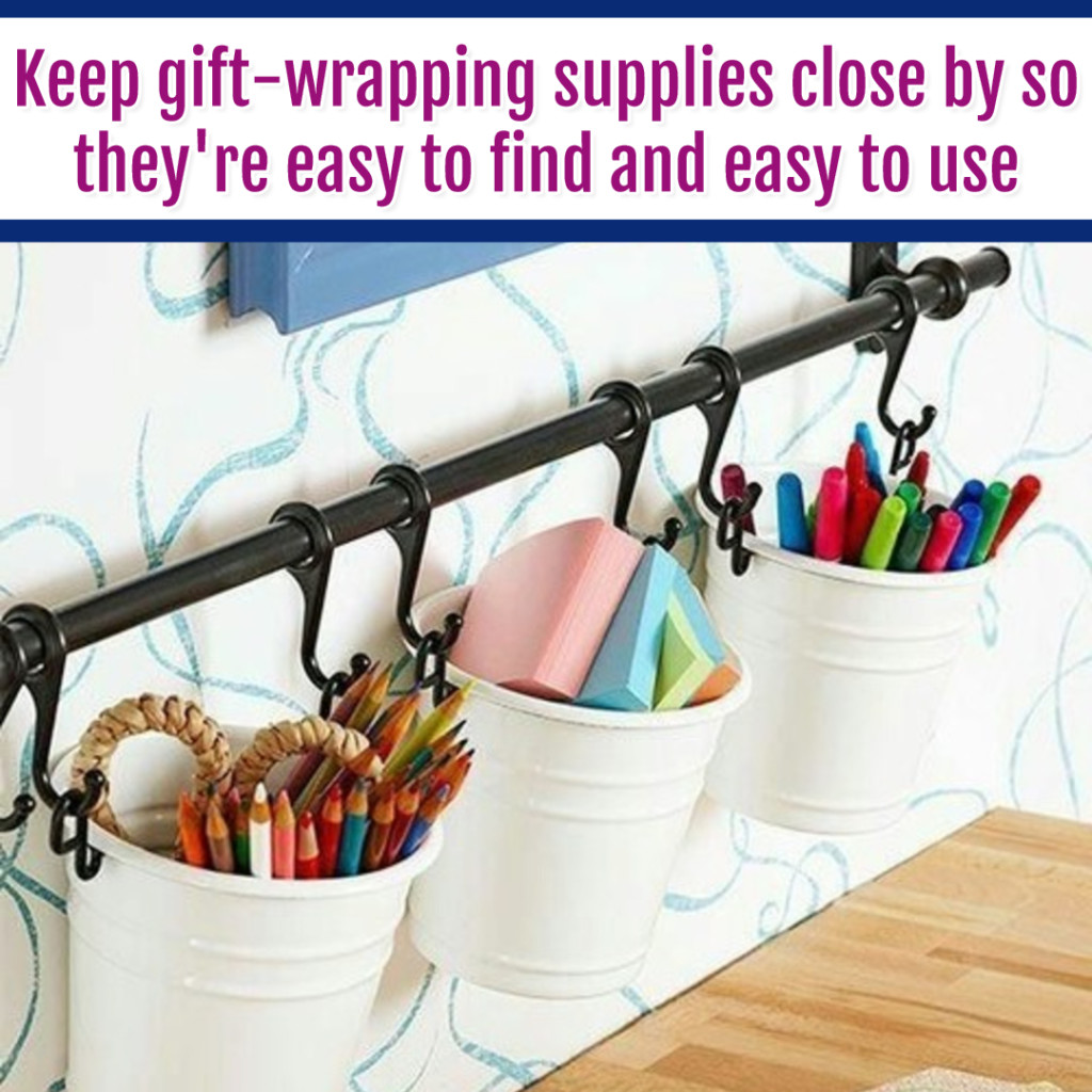 Organize Wrapping Supplies and Wrapping Paper - Organization Ideas: hang gift wrapping supplies on the wall with cheap dollar store buckets