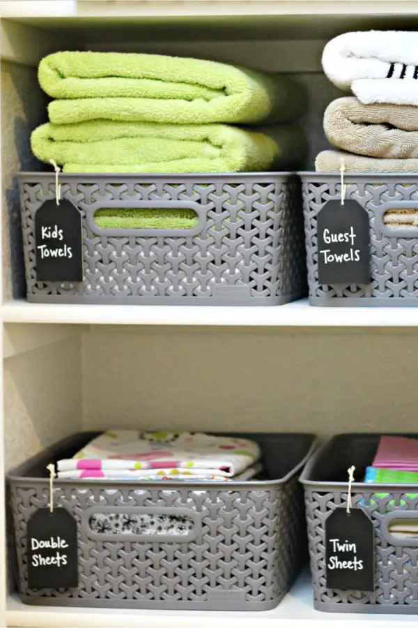 Organizing with baskets - linen closet