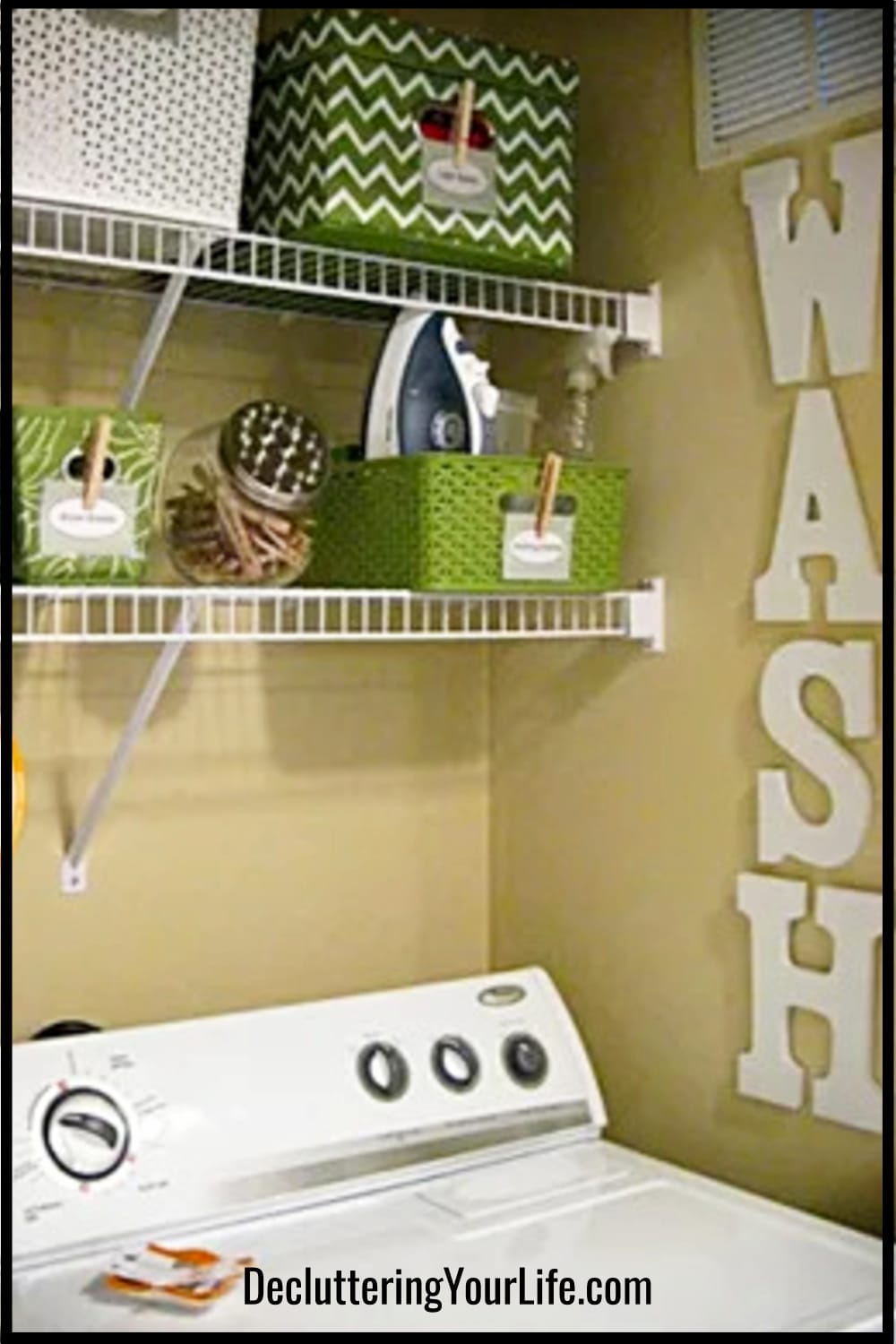 Laundry room organized with baskets on shelves over washer dryer